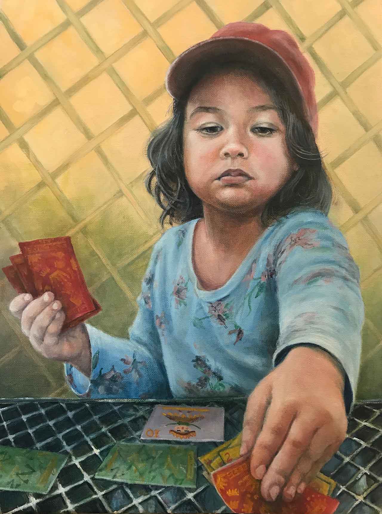 Oil painting of a girl playing a card game.. Painted by Carol Williamson.