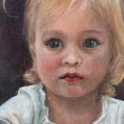 Oil painting of young girl painting holiday ornaments.